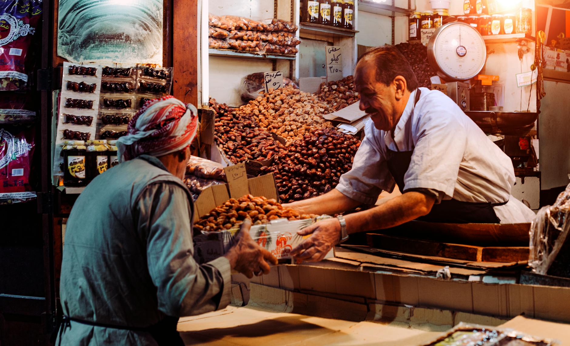 Dates and dried fruit vendor at a traditional Deira market